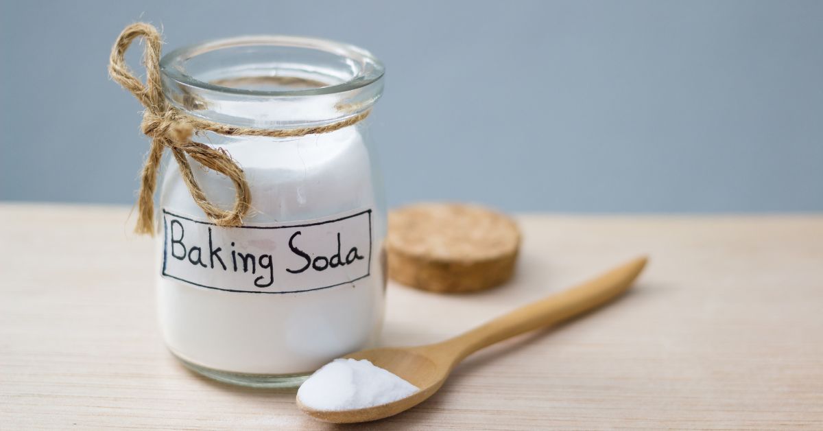 A jar full of baking soda used for cleaning.