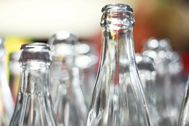 Different types of empty soda glasses.